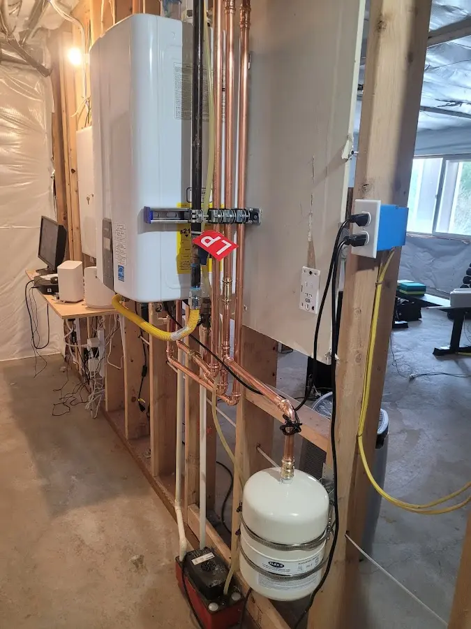 Licensed plumber repairing a kitchen sink in Silver City